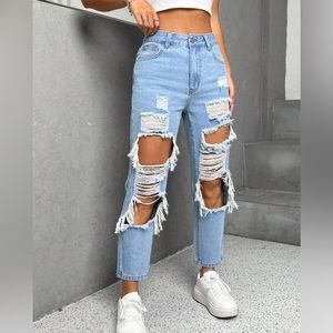 Petite light wash distressed tapered fit damaged jeans NWOT